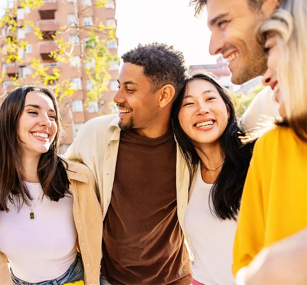 Young student friends group smile standing together outdoors