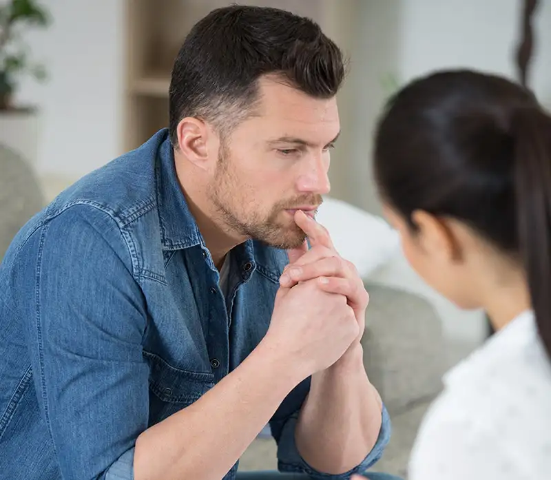 a man and his psychologist during his partial hospitalization treatment