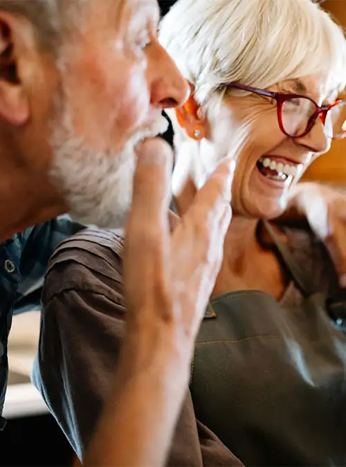 a-senior-woman-and-man-laughing